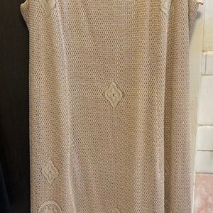 This is a vintage Onyx Nite formal dress with a lace overlay and fringe detail.